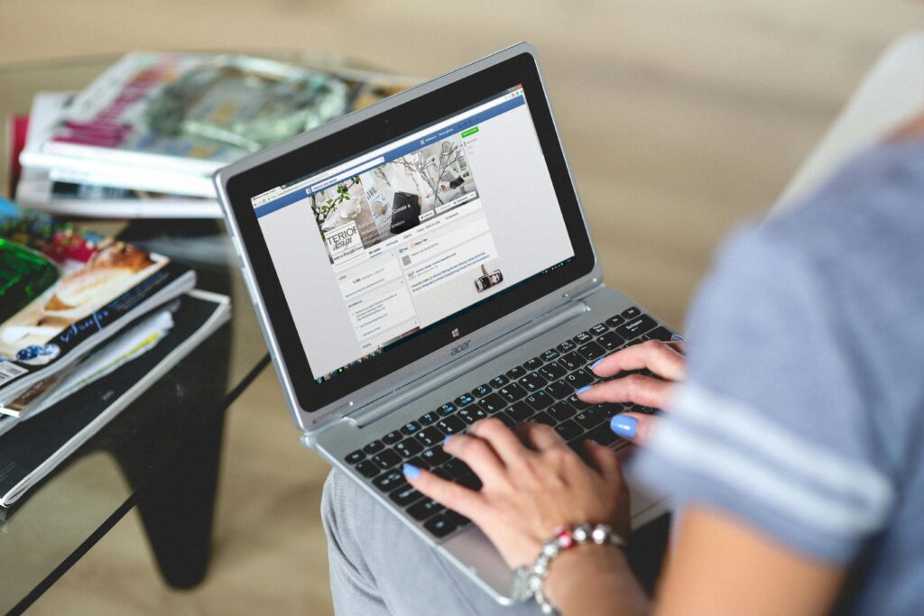 A digital marketing freelancer in India working on a laptop to manage social media and online marketing campaigns.